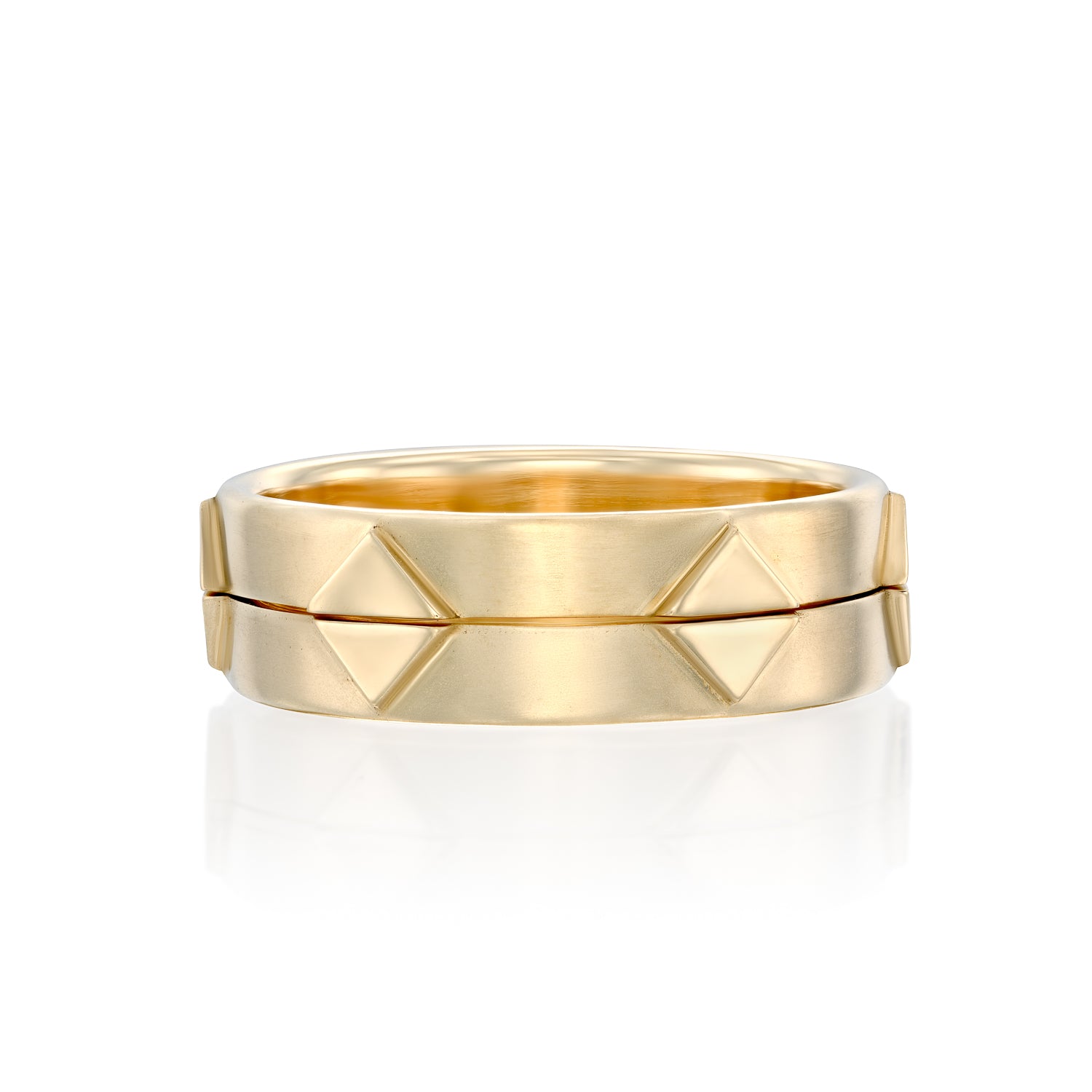 A pair of solid 14k gold rings featuring a geometric design with recessed triangular details. The combined band width is approximately 6mm, showcasing a modern and bold aesthetic.