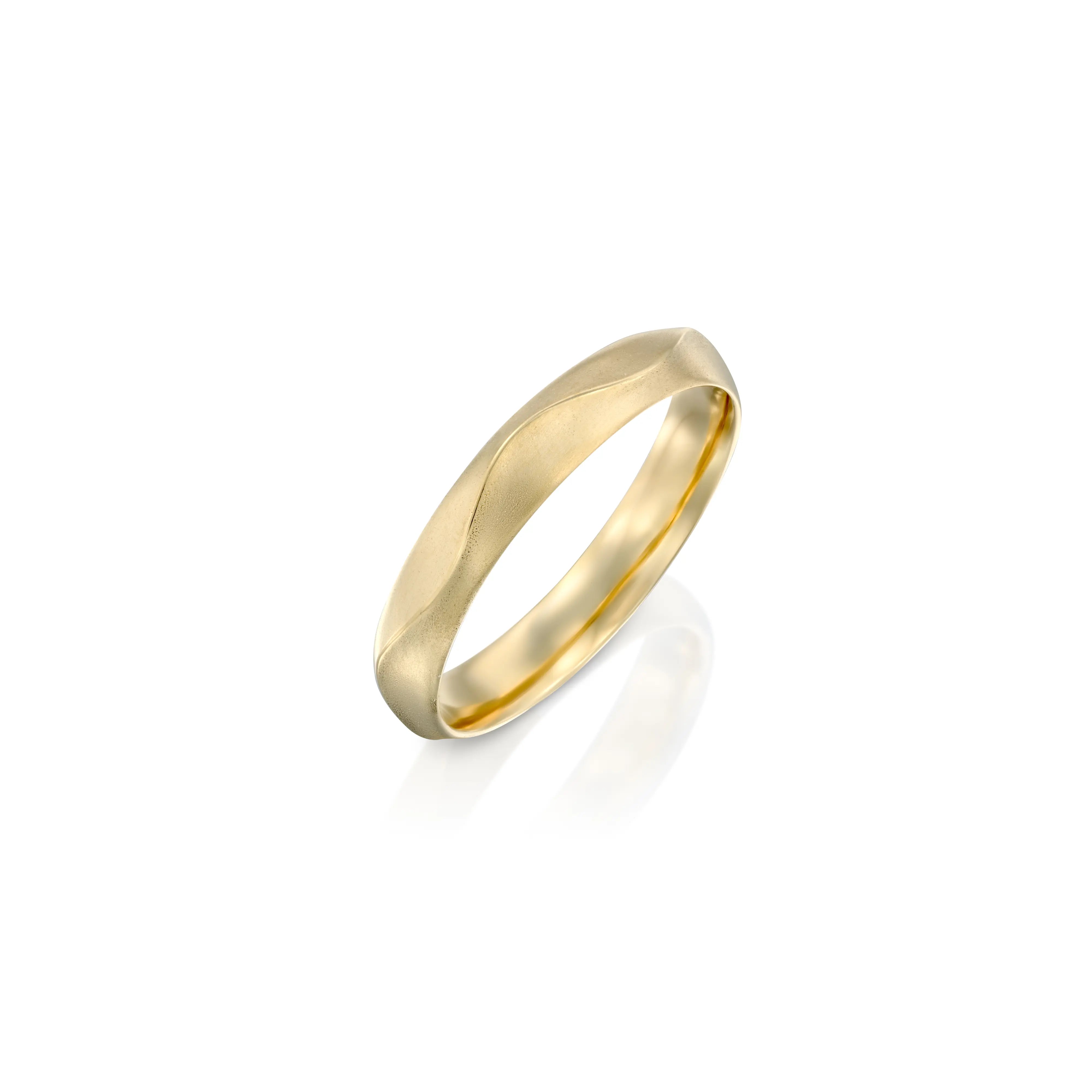 The ribbon Ring in 14k gold features a subtle ruffled texture along the band. The design is polished and measures 3.4mm in width, offering an elegant yet understated look.