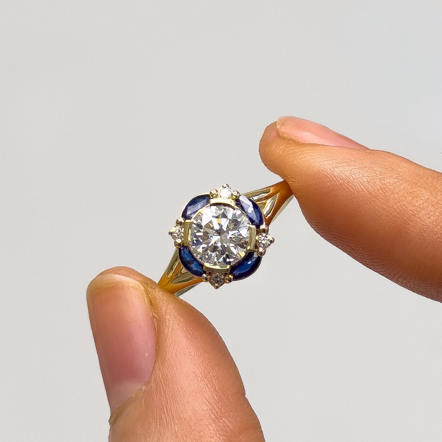 Petal Crown Ring with blue sapphires for Tal