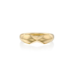 A solid 14k gold ring featuring a sleek, polished design with a tapered band. The minimalist yet bold design exudes timeless elegance.