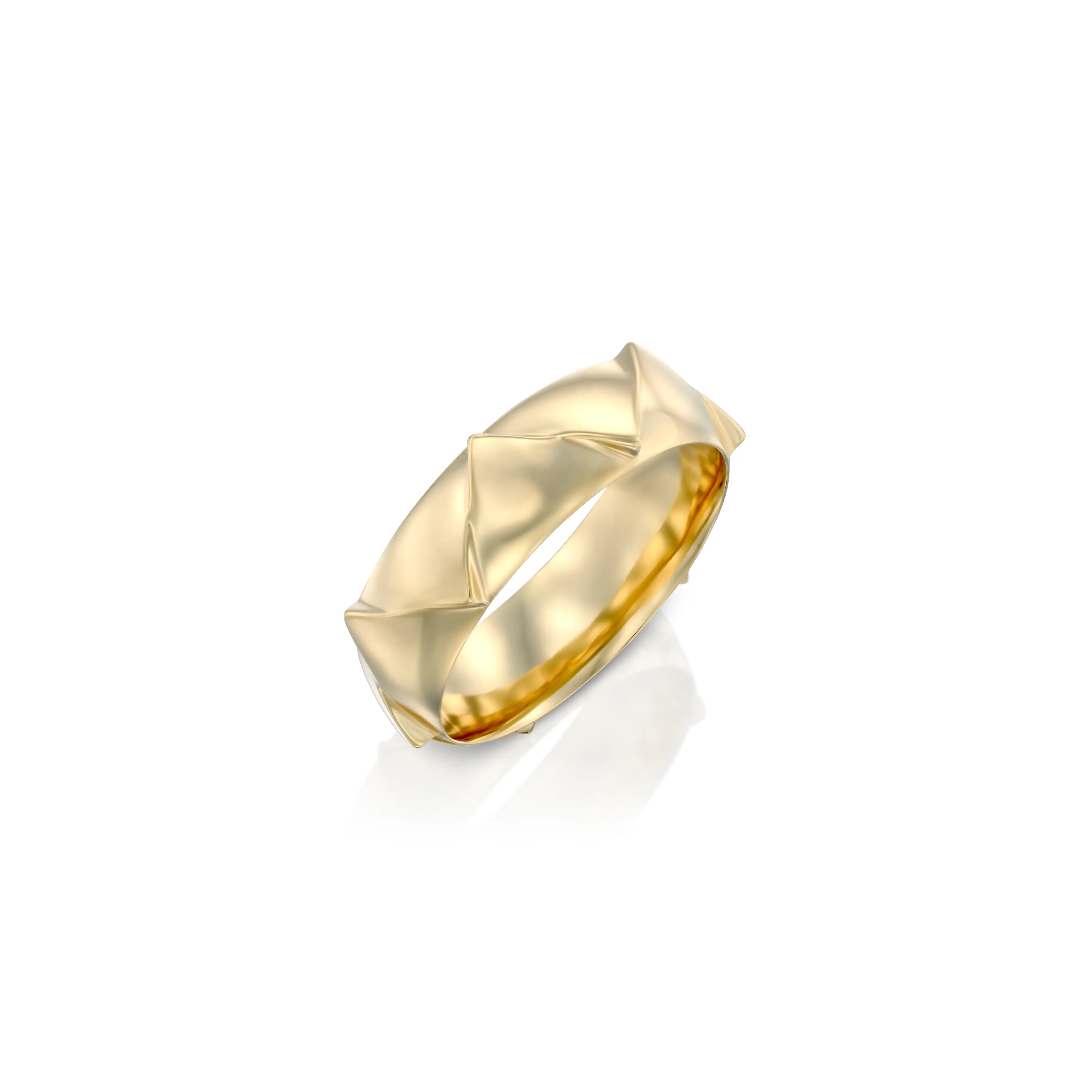 Solid 14k gold ring with a striking crown-inspired design, featuring a 5.7mm band width. Its sculptural geometry adds a bold yet refined touch.