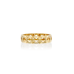 Solid 14k gold ring with a distinctive geometric pattern of engravings and recessed diamond-shaped tile cut-outs. Band width: 5mm. A bold yet refined design for any occasion